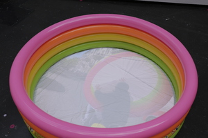 Bild:  Why not transporting a pool through Karlsruhe on a motorcicle?